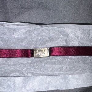 Yves Saint Laurent Black and Red ribbon Bracelet.
